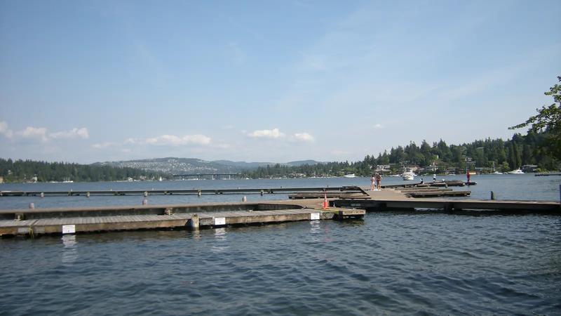 Floating docks at Luther Burbank Park on Mercer Island, with Lake Washington beyond.